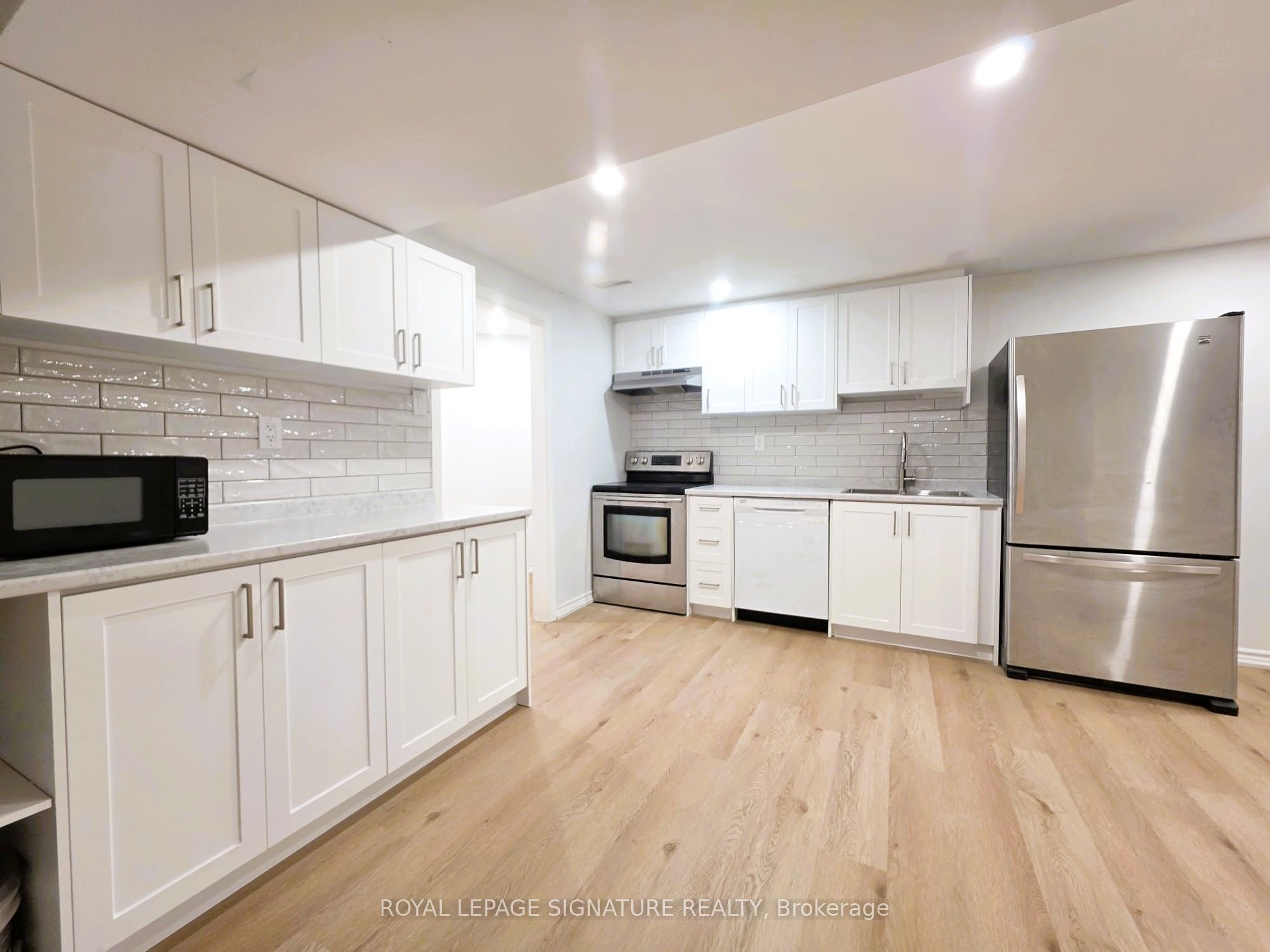 Unit Bsmt - 148 Tamarac Trail, Aurora 1
